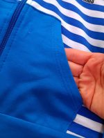 Girls' and boys' sweatshirts and trousers, sizes 35 to 50.