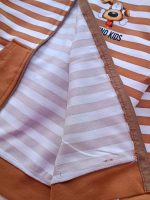 Girls' and boys' sweatshirts and trousers, sizes 35 to 50.