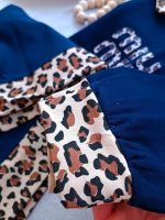 Girls' and women's blouses and trousers, sizes 40 to 75