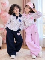 Girls' blouse and trousers, ages 4 to 11