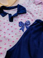 Girls' blouse and trousers, ages 4 to 11