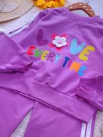 Girls' blouse and trousers, sizes 45 to 60