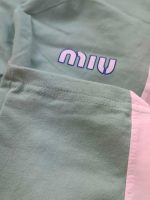 Girls' blouse and trousers, sizes 50 to 60