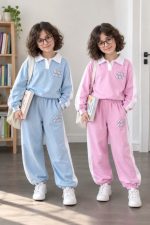 Girls' blouse and trousers, sizes 50 to 60