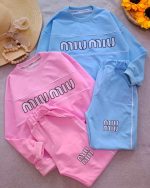 Girls' blouse and trousers, sizes 50 to 65