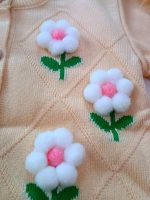 Girls' knitted cardigan, sizes 40 to 55